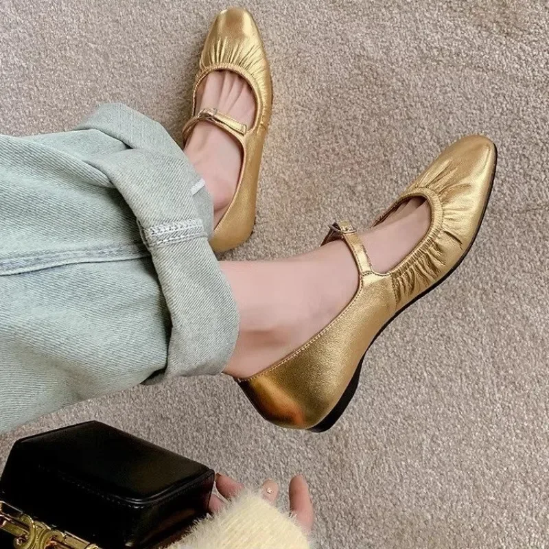 gold flat shoes