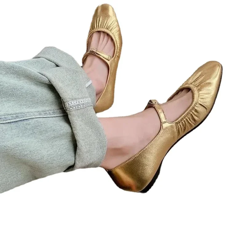 gold flat shoes